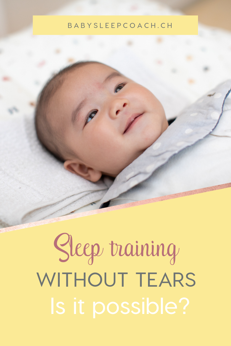 Smiling baby on a changing table. Text reads "Sleep training without tears. Is it possible?"