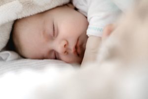 sleeping baby using gentle sleep training methods